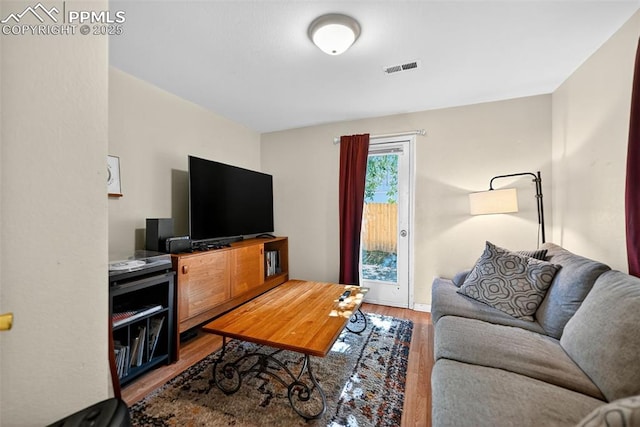 823 N Corona St, Colorado Springs, CO 80903 - living area featuring wood finished floors