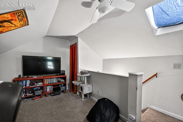 823 N Corona St, Colorado Springs, CO 80903 - living area featuring carpet, vaulted ceiling, and a ceiling fan