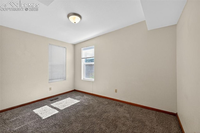 823 N Corona St, Colorado Springs, CO 80903 - carpeted spare room featuring baseboards