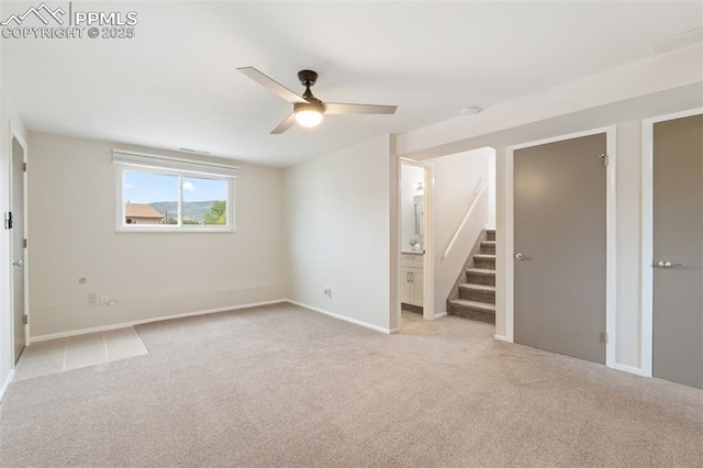 4032 E Darby Cir, Colorado Springs, CO 80907 - unfurnished bedroom with light carpet, ceiling fan, and connected bathroom