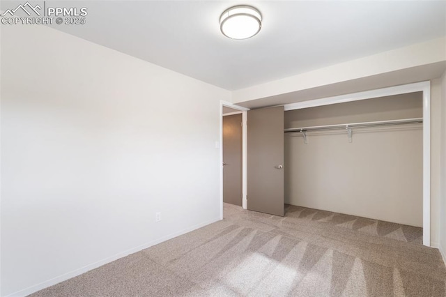 4032 E Darby Cir, Colorado Springs, CO 80907 - unfurnished bedroom with carpet floors and a closet