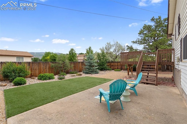 4032 E Darby Cir, Colorado Springs, CO 80907 - fenced backyard featuring a patio area and stairway
