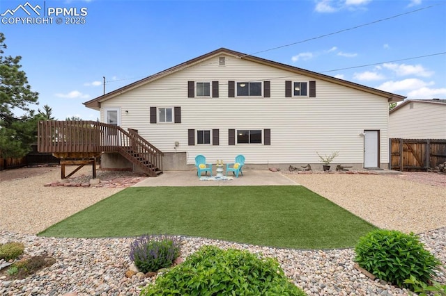 4032 E Darby Cir, Colorado Springs, CO 80907 - rear view of house featuring a patio, a deck, and stairway