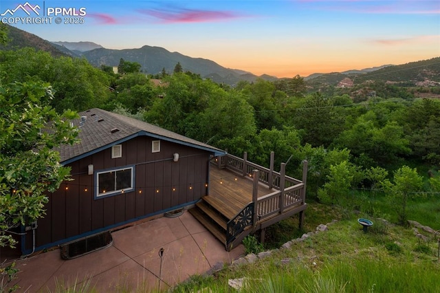 22 Puma Path, Manitou Springs, CO 80829 - aerial view of property and surrounding area with a mountain backdrop and a heavily wooded area