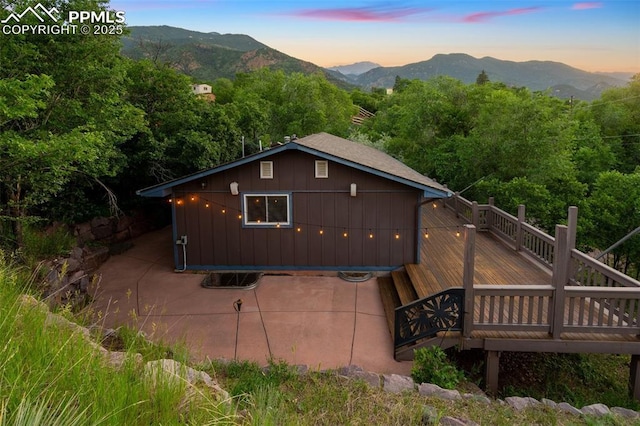 22 Puma Path, Manitou Springs, CO 80829 - rear view of house featuring a deck with mountain view