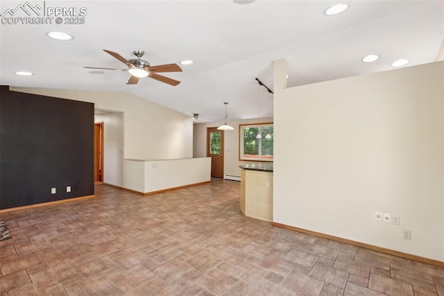 22 Puma Path, Manitou Springs, CO 80829 - empty room featuring a baseboard radiator, a ceiling fan, vaulted ceiling, and recessed lighting