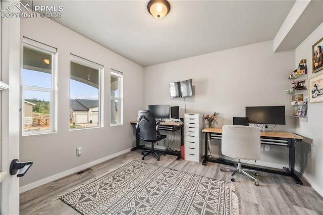 5446 Mesa Top Dr, Monument, CO 80132 - office space featuring wood finished floors and baseboards
