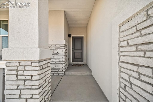 5446 Mesa Top Dr, Monument, CO 80132 - property entrance with stone siding and stucco siding