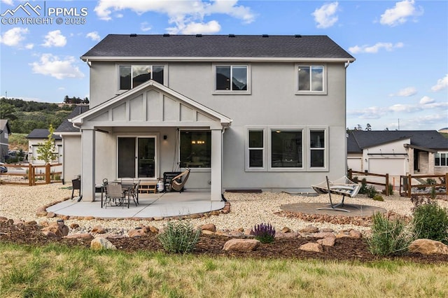 5446 Mesa Top Dr, Monument, CO 80132 - back of house with a patio, a fenced backyard, and stucco siding