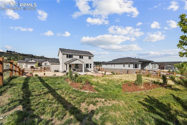 5446 Mesa Top Dr, Monument, CO 80132 - back of house with a patio area and a fenced backyard