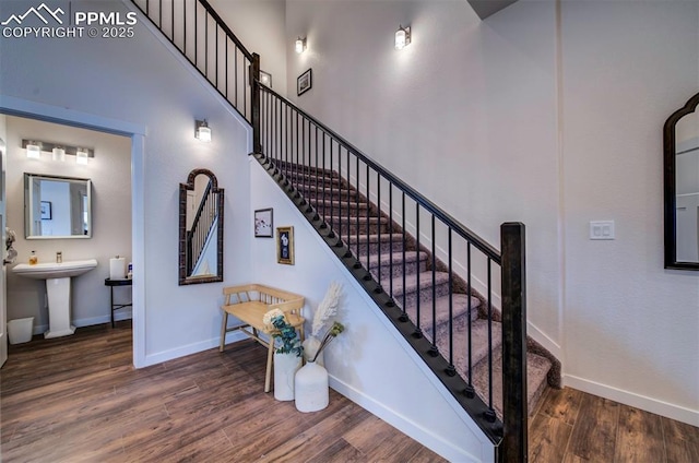 2186 Keara Hts, Colorado Springs, CO 80919 - staircase with wood finished floors and baseboards