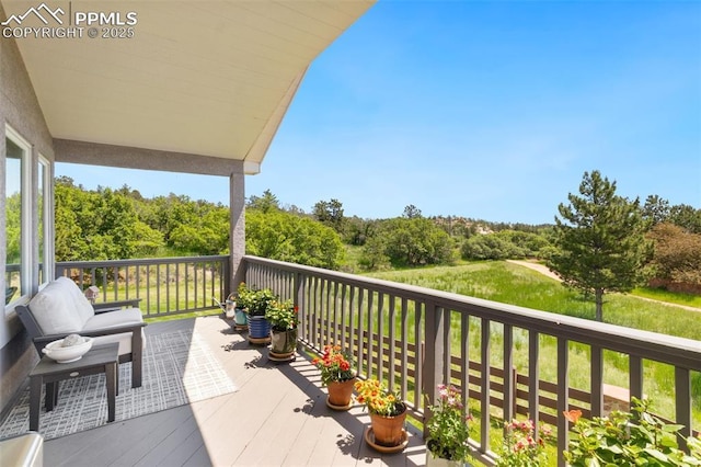 1690 Doe Run Pt, Colorado Springs, CO 80919 - view of wooden terrace