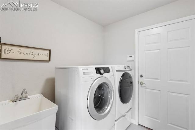 1690 Doe Run Pt, Colorado Springs, CO 80919 - laundry area with washing machine and dryer