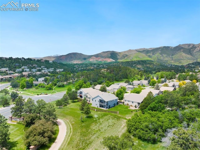 1690 Doe Run Pt, Colorado Springs, CO 80919 - aerial view of residential area with mountains
