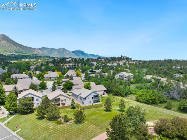 1690 Doe Run Pt, Colorado Springs, CO 80919 - aerial perspective of suburban area with a mountain backdrop