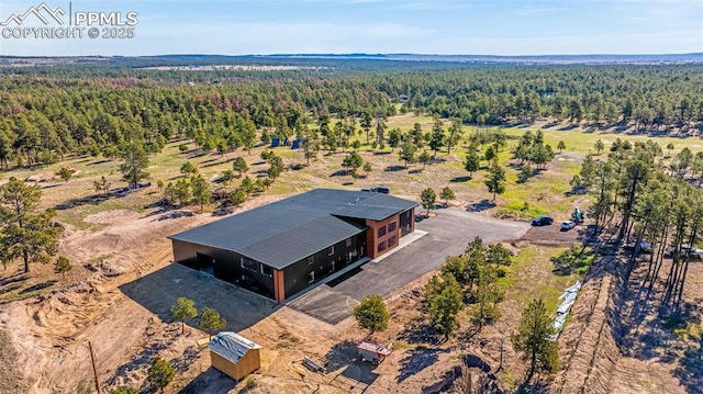 11910 Green Acres Ln, Colorado Springs, CO 80908 - view from above of property with a heavily wooded area
