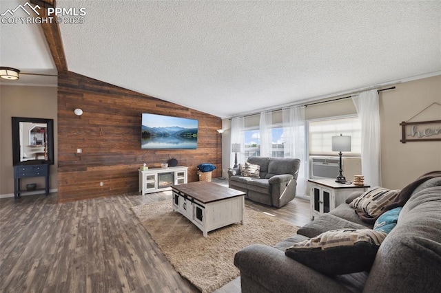 5664 Southfork Dr, Peyton, CO 80831 - living area with wood walls, wood finished floors, and a textured ceiling