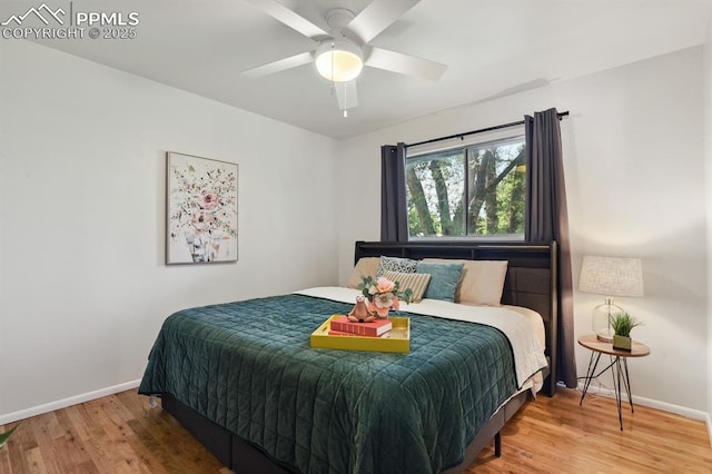 906 Bowser Dr, Colorado Springs, CO 80909 - bedroom with wood finished floors and a ceiling fan