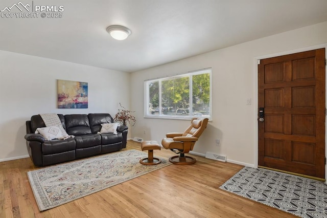 906 Bowser Dr, Colorado Springs, CO 80909 - living room with wood finished floors and baseboards