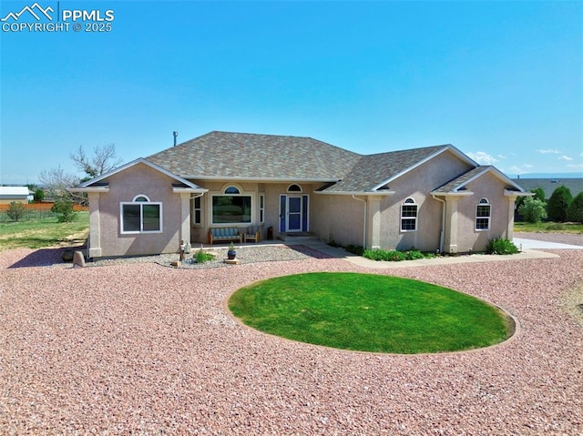 1314 W Carrizo Springs Ave, Pueblo West, CO 81007 - ranch-style house featuring stucco siding, a porch, and roof with shingles