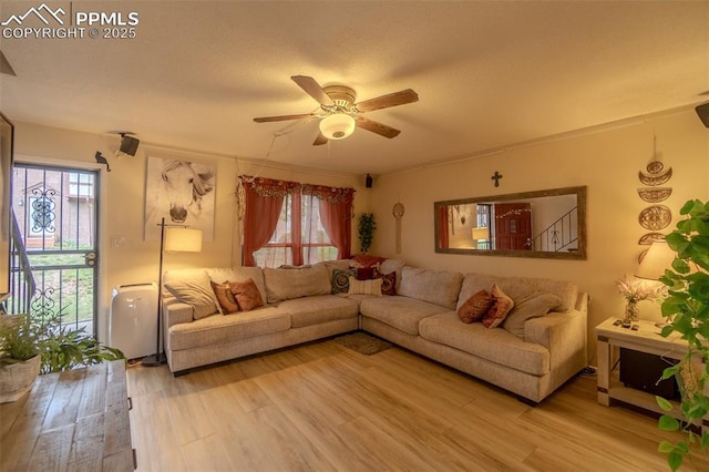 2021 N Academy Blvd, Colorado Springs, CO 80909 - living area featuring light wood-style flooring and ceiling fan