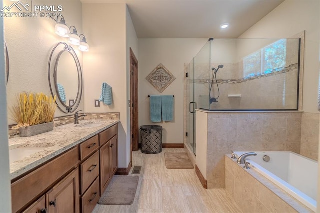 15324 Pole Pine Pt, Colorado Springs, CO 80908 - full bath featuring a stall shower, double vanity, and a bath