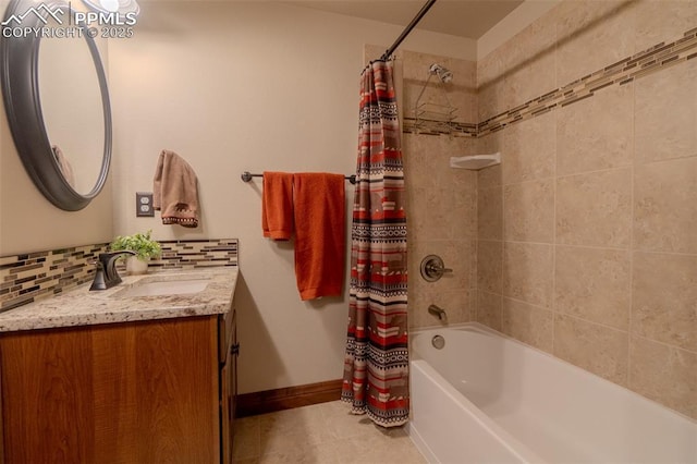 15324 Pole Pine Pt, Colorado Springs, CO 80908 - bathroom featuring vanity, shower / tub combo, decorative backsplash, and tile patterned flooring