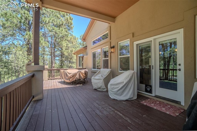 15324 Pole Pine Pt, Colorado Springs, CO 80908 - wooden deck with area for grilling