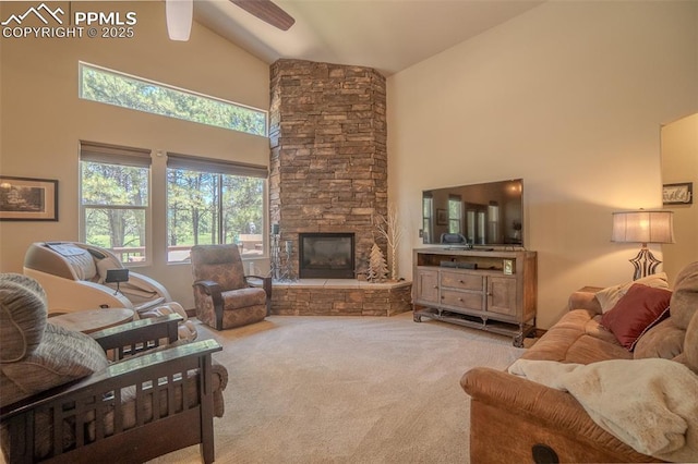 15324 Pole Pine Pt, Colorado Springs, CO 80908 - living area featuring high vaulted ceiling, carpet floors, ceiling fan, and a fireplace