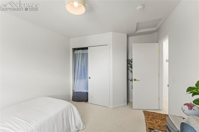 1773 Herd St, Colorado Springs, CO 80910 - bedroom with light carpet, attic access, and a closet