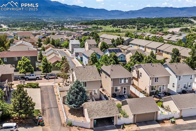 1773 Herd St, Colorado Springs, CO 80910 - aerial perspective of suburban area with a mountain backdrop
