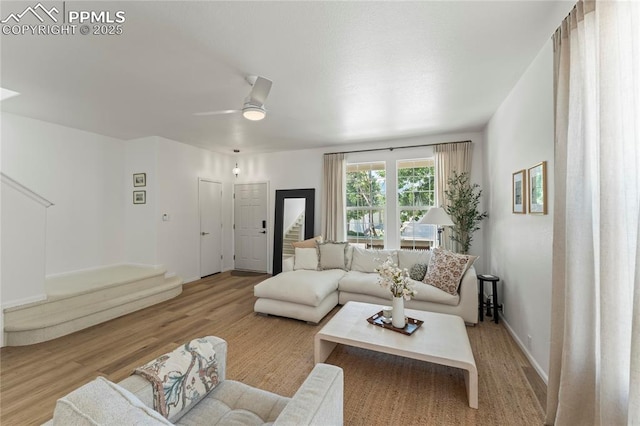 1773 Herd St, Colorado Springs, CO 80910 - living room featuring light wood-style floors and a ceiling fan