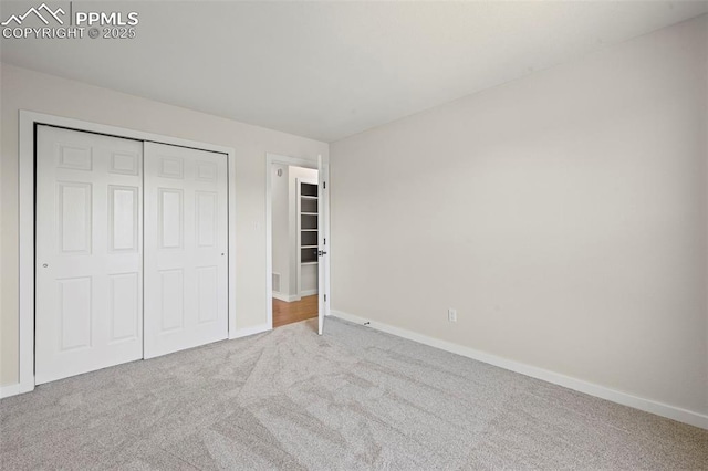 110 Fox Hill Ln, Colorado Springs, CO 80919 - unfurnished bedroom with carpet flooring and a closet