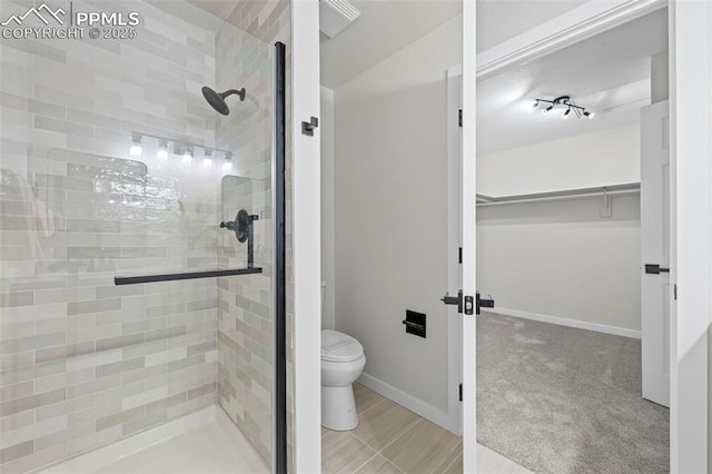 110 Fox Hill Ln, Colorado Springs, CO 80919 - bathroom featuring a shower stall and a spacious closet