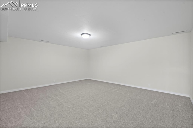 110 Fox Hill Ln, Colorado Springs, CO 80919 - additional living space with carpet floors and baseboards