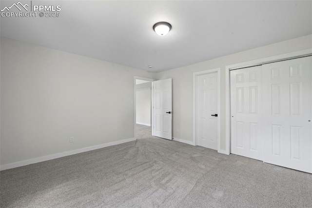110 Fox Hill Ln, Colorado Springs, CO 80919 - unfurnished bedroom with carpet flooring and baseboards