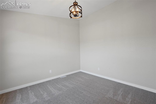 110 Fox Hill Ln, Colorado Springs, CO 80919 - empty room featuring a chandelier and carpet flooring