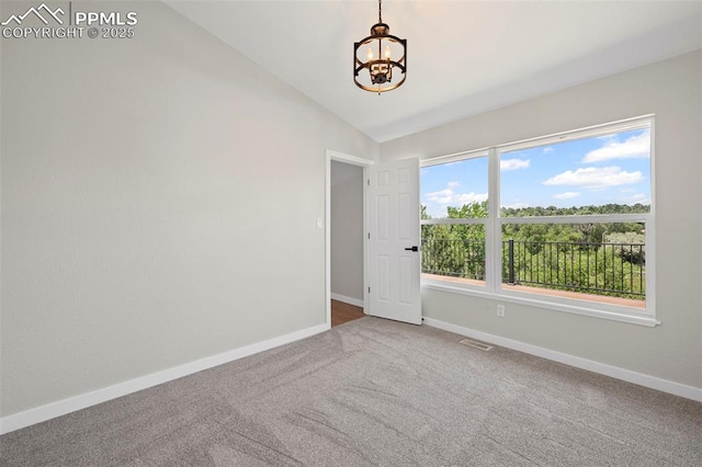 110 Fox Hill Ln, Colorado Springs, CO 80919 - carpeted spare room with a chandelier and lofted ceiling