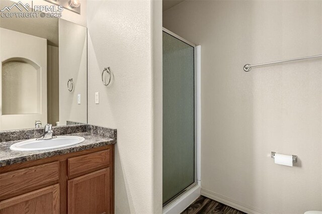 5718 Badenoch Ter, Colorado Springs, CO 80923 - full bathroom with a shower stall and vanity