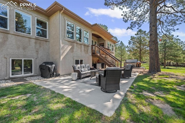15704 Pole Pine Pt, Colorado Springs, CO 80908 - view of patio with outdoor lounge area, a grill, and stairway