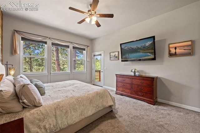 15704 Pole Pine Pt, Colorado Springs, CO 80908 - bedroom with access to exterior, carpet floors, and ceiling fan