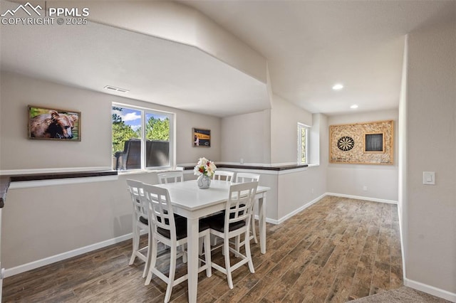 15704 Pole Pine Pt, Colorado Springs, CO 80908 - dining space featuring wood finished floors and recessed lighting