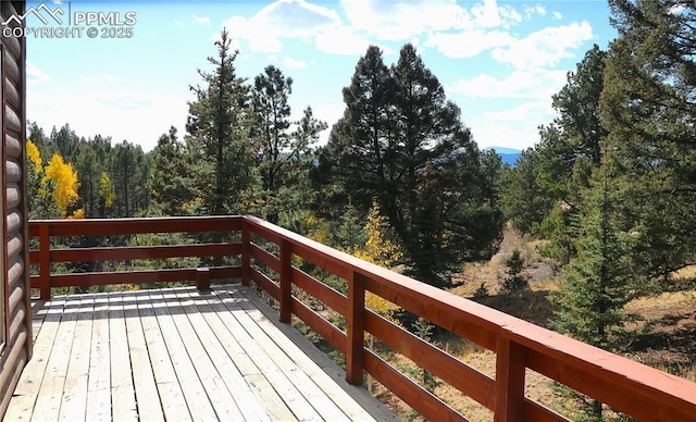 130 Oak Ln, Florissant, CO 80816 - wooden deck with a forest view
