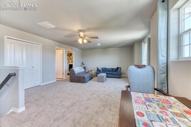 8285 Lodge Grass Way, Colorado Springs, CO 80908 - carpeted living area featuring baseboards and ceiling fan