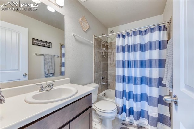 8285 Lodge Grass Way, Colorado Springs, CO 80908 - bathroom featuring vanity, shower / bathtub combination with curtain, and a textured wall