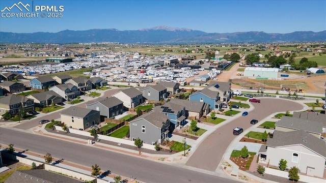 8285 Lodge Grass Way, Colorado Springs, CO 80908 - aerial perspective of suburban area with a mountain backdrop