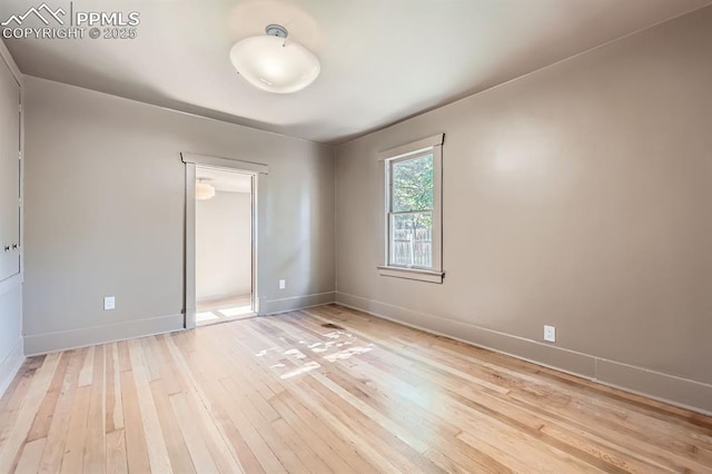420 E Fontanero St, Colorado Springs, CO 80907 - empty room with light wood-style flooring and baseboards