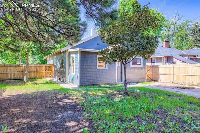 420 E Fontanero St, Colorado Springs, CO 80907 - back of property featuring a fenced backyard