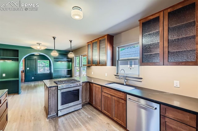 420 E Fontanero St, Colorado Springs, CO 80907 - kitchen featuring appliances with stainless steel finishes, light wood-style flooring, and healthy amount of natural light