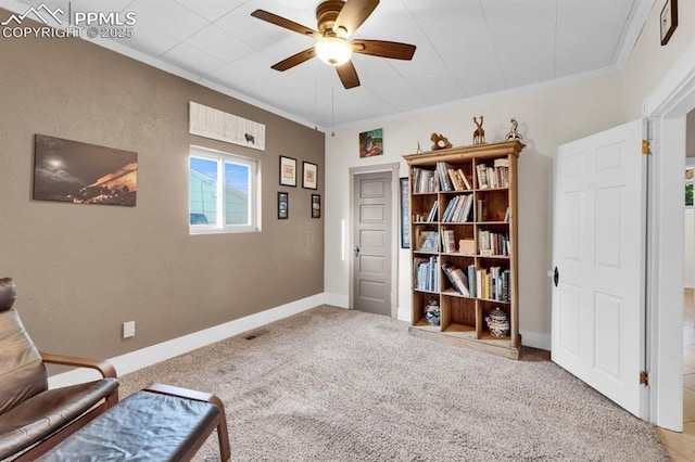 1339 Arch St, Colorado Springs, CO 80904 - living area featuring a ceiling fan, carpet flooring, and crown molding